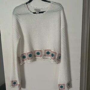 Womens crocheted style cropped sweater.